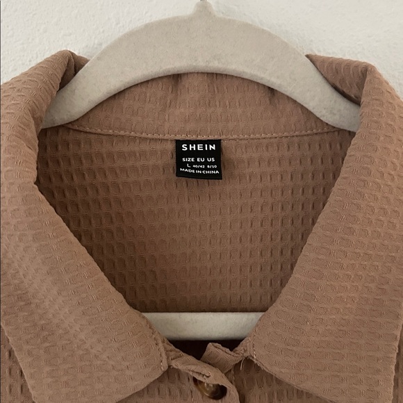 This is a Shein button-front peplum blouse - Picture 8 of 9